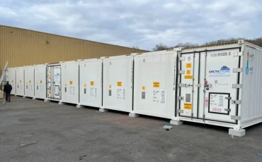 Modular cold storage container installation forming a SuperStore unit